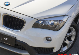 Подержанный автомобиль BMW X1 2014 года (20 фото)