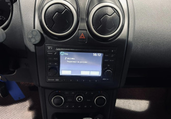 Подержанный автомобиль Nissan Qashqai+2 2011 года (14 фото)
