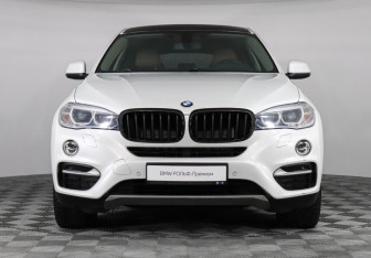 Подержанный автомобиль BMW X6 2015 года (3 фото)