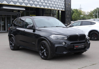 Подержанный автомобиль BMW X5 2014 года (3 фото)