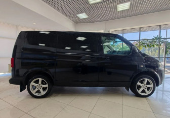 Подержанный автомобиль Volkswagen Caravelle 2014 года (4 фото)
