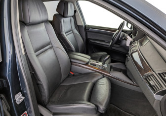 Подержанный автомобиль BMW X6 2013 года (24 фото)