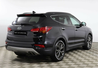 Подержанный автомобиль Hyundai Santa Fe 2016 года (3 фото)