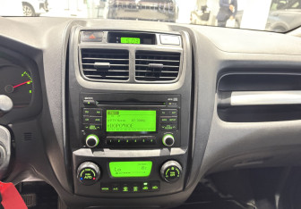 Подержанный автомобиль Kia Sportage 2009 года (9 фото)