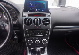 Подержанный автомобиль Mazda 6 Liftback 2006 года (15 фото)