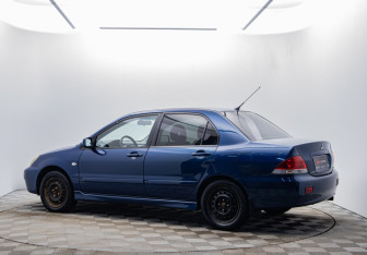 Подержанный автомобиль Mitsubishi Lancer Sedan 2006 года (7 фото)