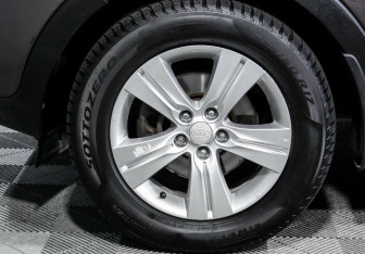 Подержанный автомобиль Kia Sportage 2012 года (7 фото)