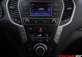Подержанный автомобиль Hyundai Santa Fe 2016 года (14 фото)