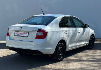 Подержанный автомобиль Skoda Rapid Liftback 2015 года (5 фото)