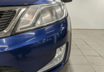Подержанный автомобиль Kia Rio Hatchback 2014 года (16 фото)