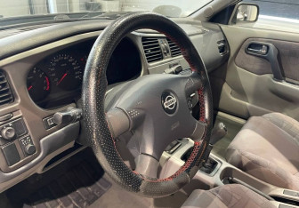 Подержанный автомобиль Nissan Primera Wagon 2001 года (13 фото)