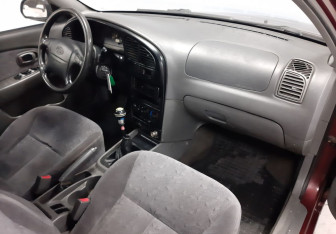 Подержанный автомобиль Kia Spectra Sedan 2007 года (17 фото)