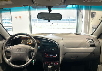 Подержанный автомобиль Kia Spectra Sedan 2007 года (15 фото)