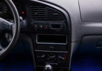 Подержанный автомобиль Kia Spectra Sedan 2006 года (14 фото)