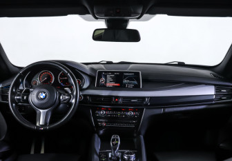 Подержанный автомобиль BMW X6 2016 года (17 фото)