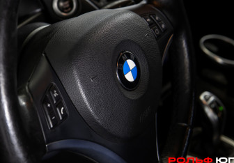 Подержанный автомобиль BMW X1 2012 года (14 фото)