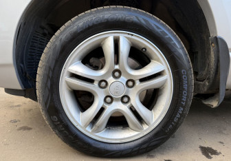Подержанный автомобиль Kia Sportage 2007 года (9 фото)