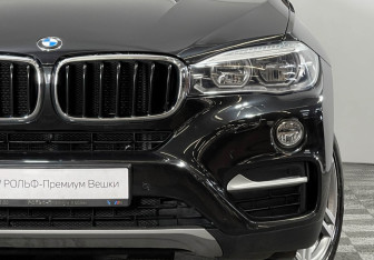 Подержанный автомобиль BMW X6 2015 года (8 фото)