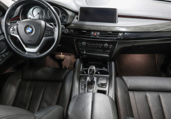 Подержанный автомобиль BMW X6 2015 года (15 фото)