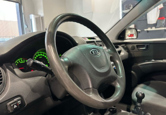 Подержанный автомобиль Kia Sportage 2009 года (13 фото)