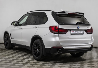 Подержанный автомобиль BMW X5 2014 года (7 фото)