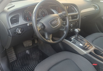 Подержанный автомобиль Audi A4 Sedan 2014 года (14 фото)