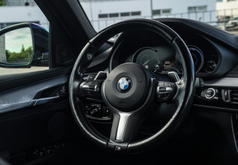 Подержанный автомобиль BMW X6 2018 года (10 фото)