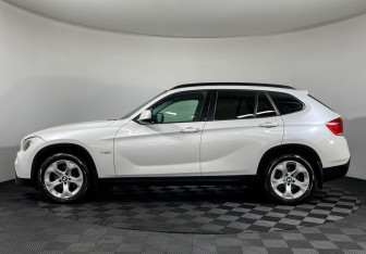 Подержанный автомобиль BMW X1 2011 года (5 фото)