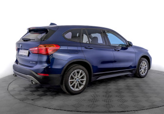 Подержанный автомобиль BMW X1 2018 года (5 фото)