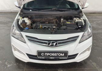 Подержанный автомобиль Hyundai Solaris Sedan 2014 года (16 фото)
