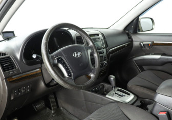 Подержанный автомобиль Hyundai Santa Fe 2010 года (13 фото)
