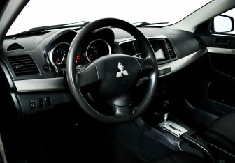 Подержанный автомобиль Mitsubishi Lancer Sedan 2012 года (7 фото)
