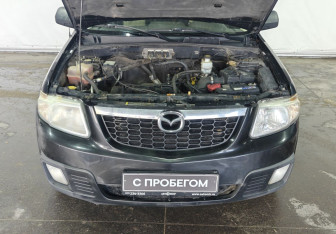 Подержанный автомобиль Mazda Tribute 2007 года (17 фото)