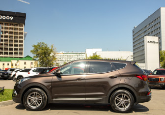 Подержанный автомобиль Hyundai Santa Fe 2016 года (6 фото)