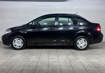 Подержанный автомобиль Nissan Tiida Sedan 2013 года (8 фото)