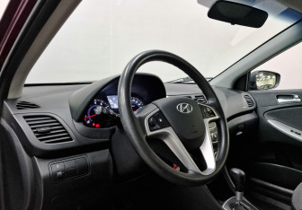 Подержанный автомобиль Hyundai Solaris Sedan 2013 года (15 фото)