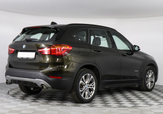 Подержанный автомобиль BMW X1 2017 года (2 фото)