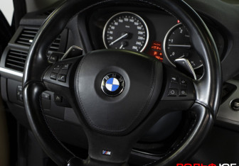 Подержанный автомобиль BMW X5 2009 года (15 фото)