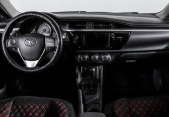 Подержанный автомобиль Toyota Corolla Sedan 2014 года (12 фото)