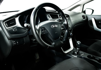 Подержанный автомобиль Kia Ceed Hatchback 2014 года (9 фото)