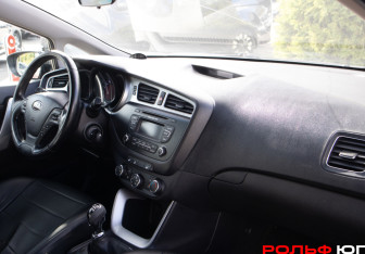 Подержанный автомобиль Kia Ceed Wagon 2014 года (7 фото)