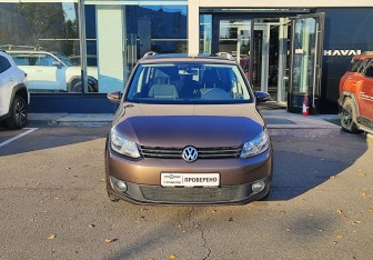Подержанный автомобиль Volkswagen Touran 2012 года (2 фото)