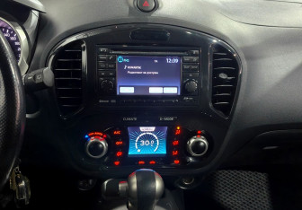Подержанный автомобиль Nissan Juke 2012 года (13 фото)