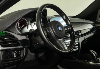 Подержанный автомобиль BMW X6 2018 года (11 фото)