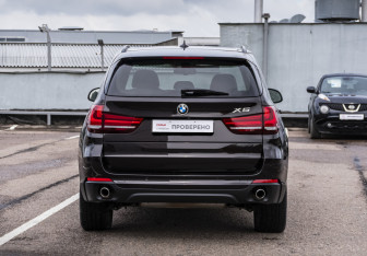 Подержанный автомобиль BMW X5 2014 года (6 фото)