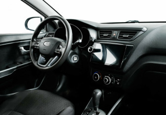 Подержанный автомобиль Kia Rio Sedan 2012 года (8 фото)