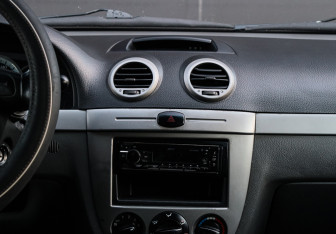 Подержанный автомобиль Chevrolet Lacetti Hatchback 2011 года (10 фото)