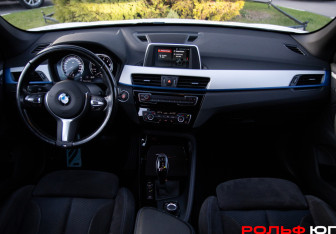 Подержанный автомобиль BMW X1 2018 года (11 фото)