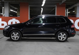 Подержанный автомобиль Volkswagen Touareg 2014 года (8 фото)