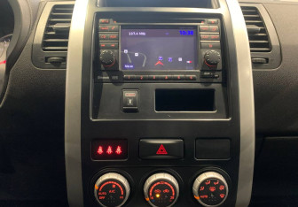 Подержанный автомобиль Nissan X-Trail 2013 года (18 фото)